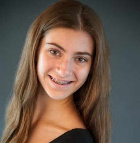 Grace Rabinowitz2016-2017 Teen Advisors (close angle, school picture) with her smiley face facing the camera, and grey background