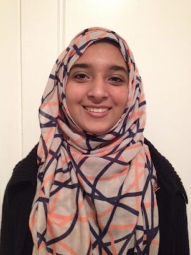 Sabah Hussain_ 2015-2016 Teen Advisors (headshot) with her smiley face facing the camera wearing her grey color Hijab