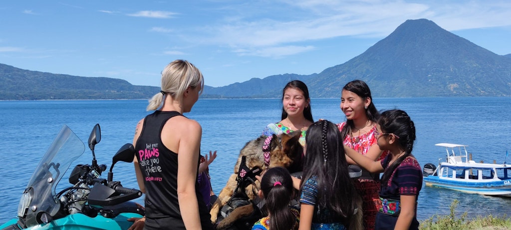 Jess with a group of girls at Playa Publica Panjachel in Guatemala