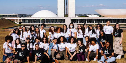 Girl Up Brasil staff in front of Brasil's parliament